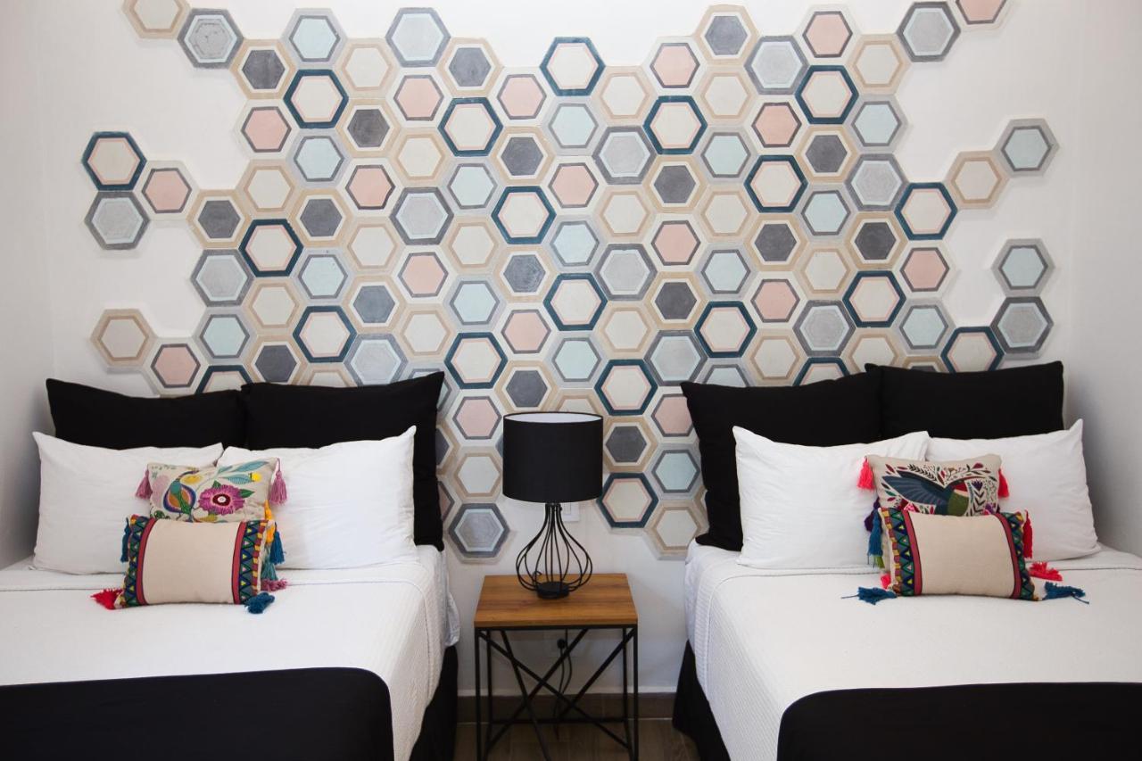 Hotel Casa Chukum Bacalar Exterior foto Hexagon wall art