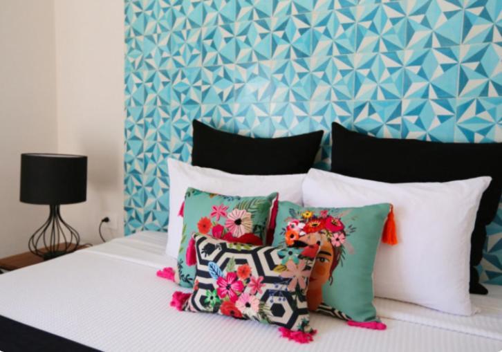 Hotel Casa Chukum Bacalar Exterior foto A bed with cushions